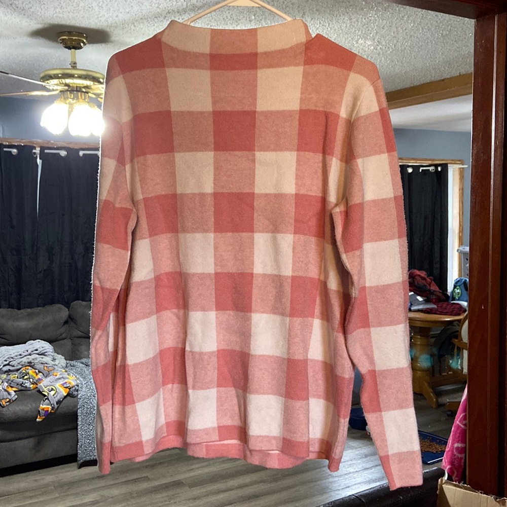 Pink plaid turtleneck sweater